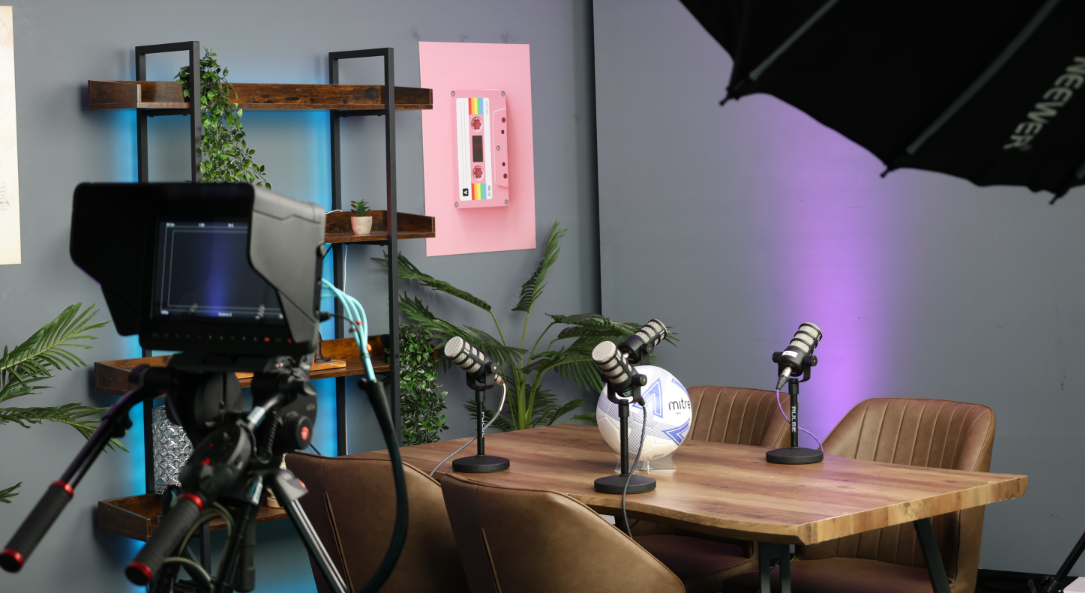 Podcast studio with multiple microphones, ideal for virtual events and panel discussions.