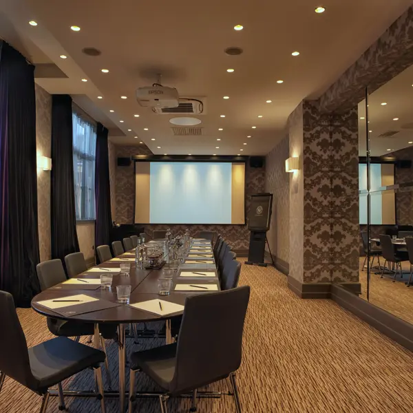 Modern meeting room in Malmaison Newcastle, ideal for conferences and professional gatherings.