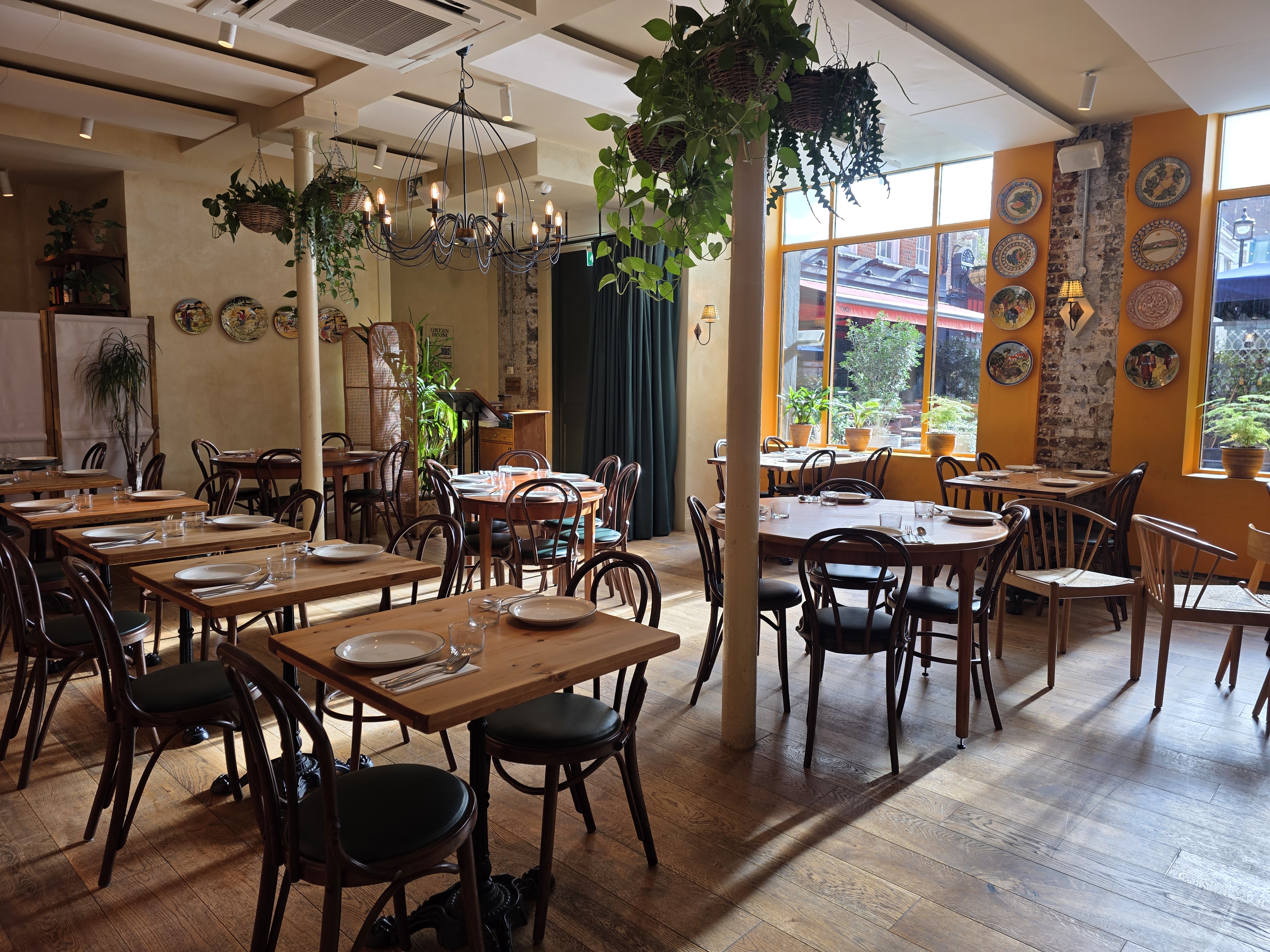 Charming dining space at Bar Side, Casa Mayfair, ideal for intimate events and brunches.