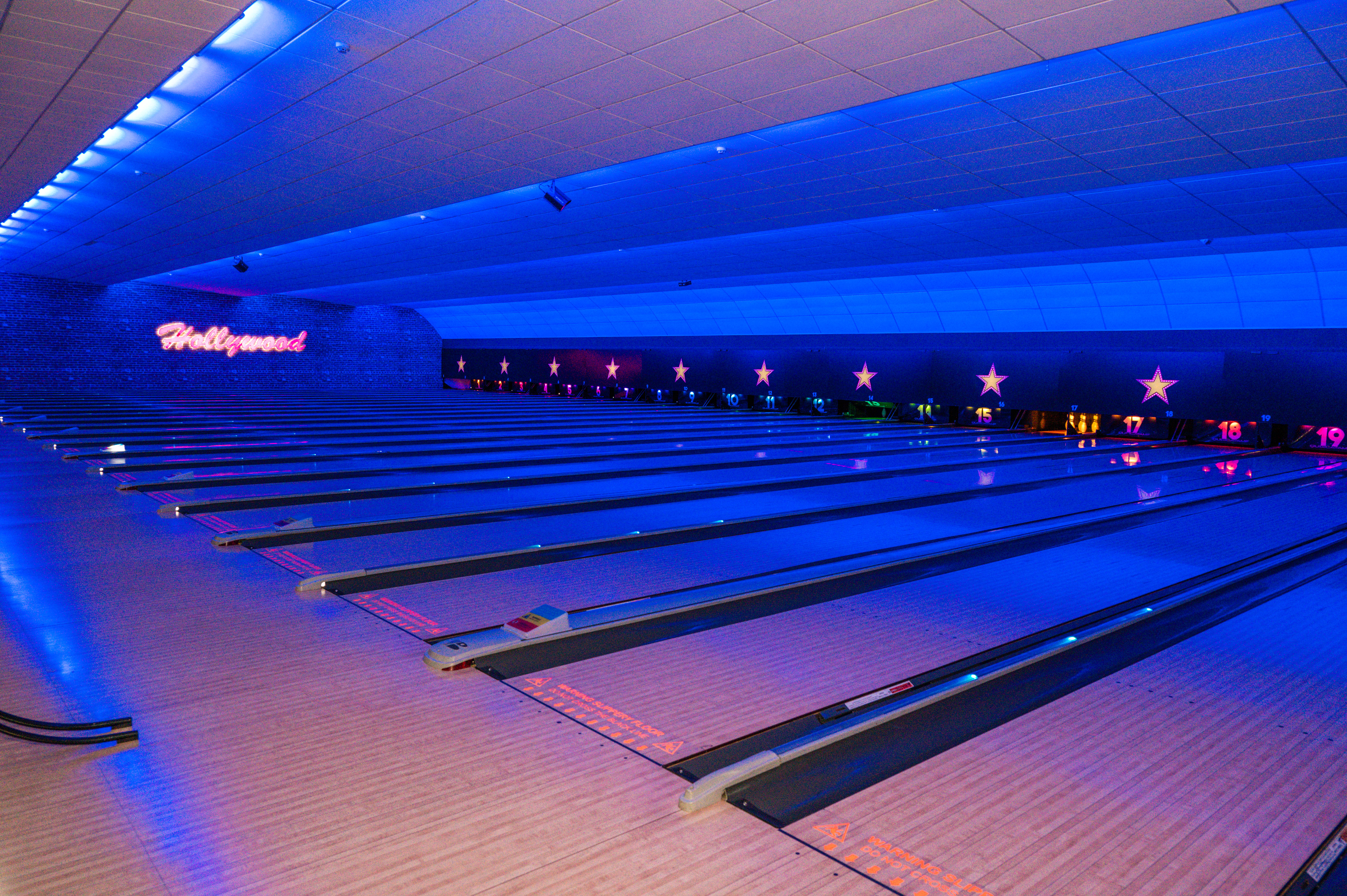 Hollywood Bowl Wolverhampton: Corporate team building venue with atmospheric lighting.