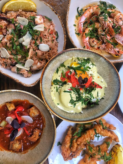 “Gourmet dishes on semi-private mezzanine at Casa do Frango for events and meetings.”