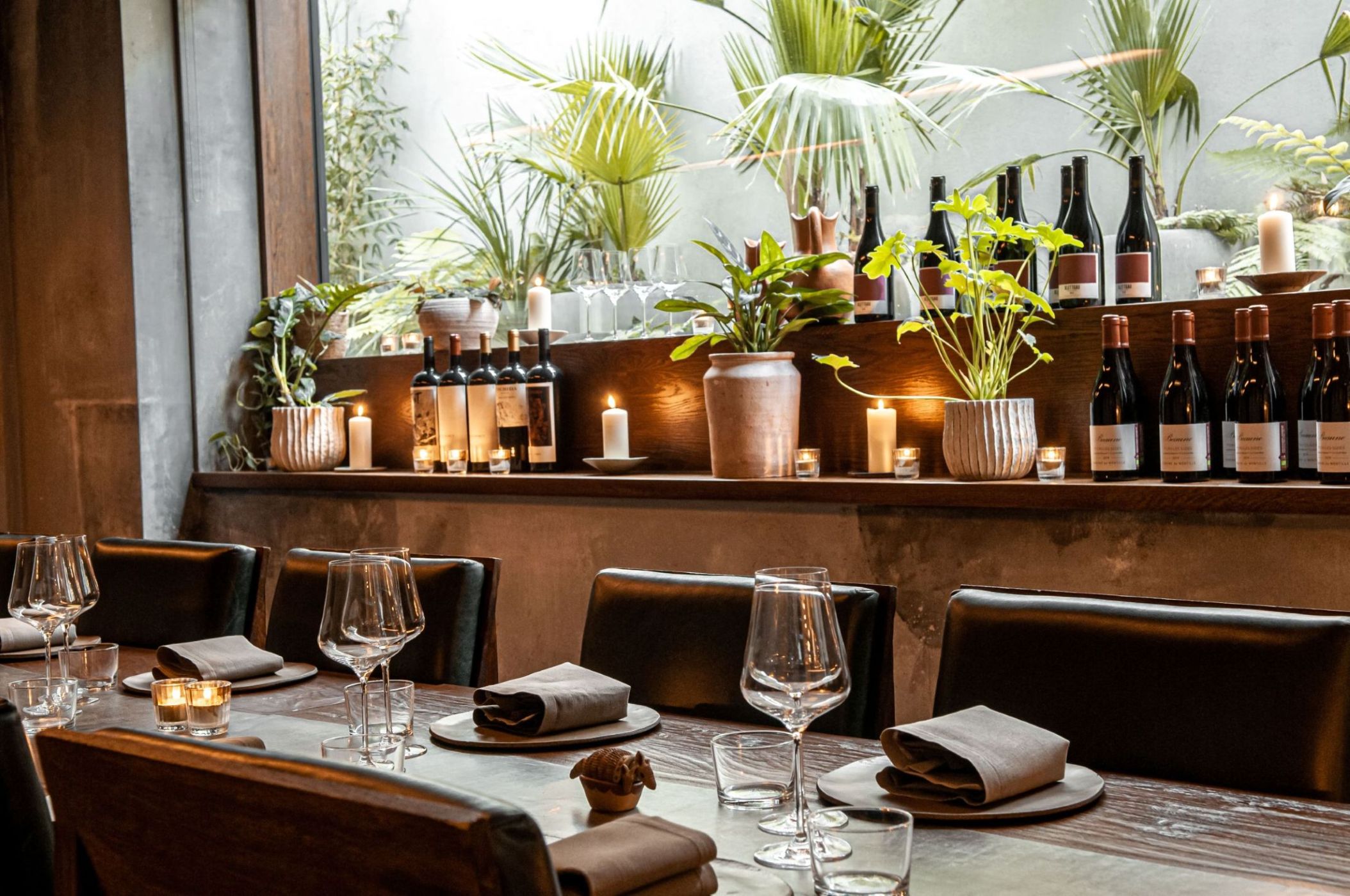 Elegant dining setup at Chef's Table KOL for upscale events with natural lighting.