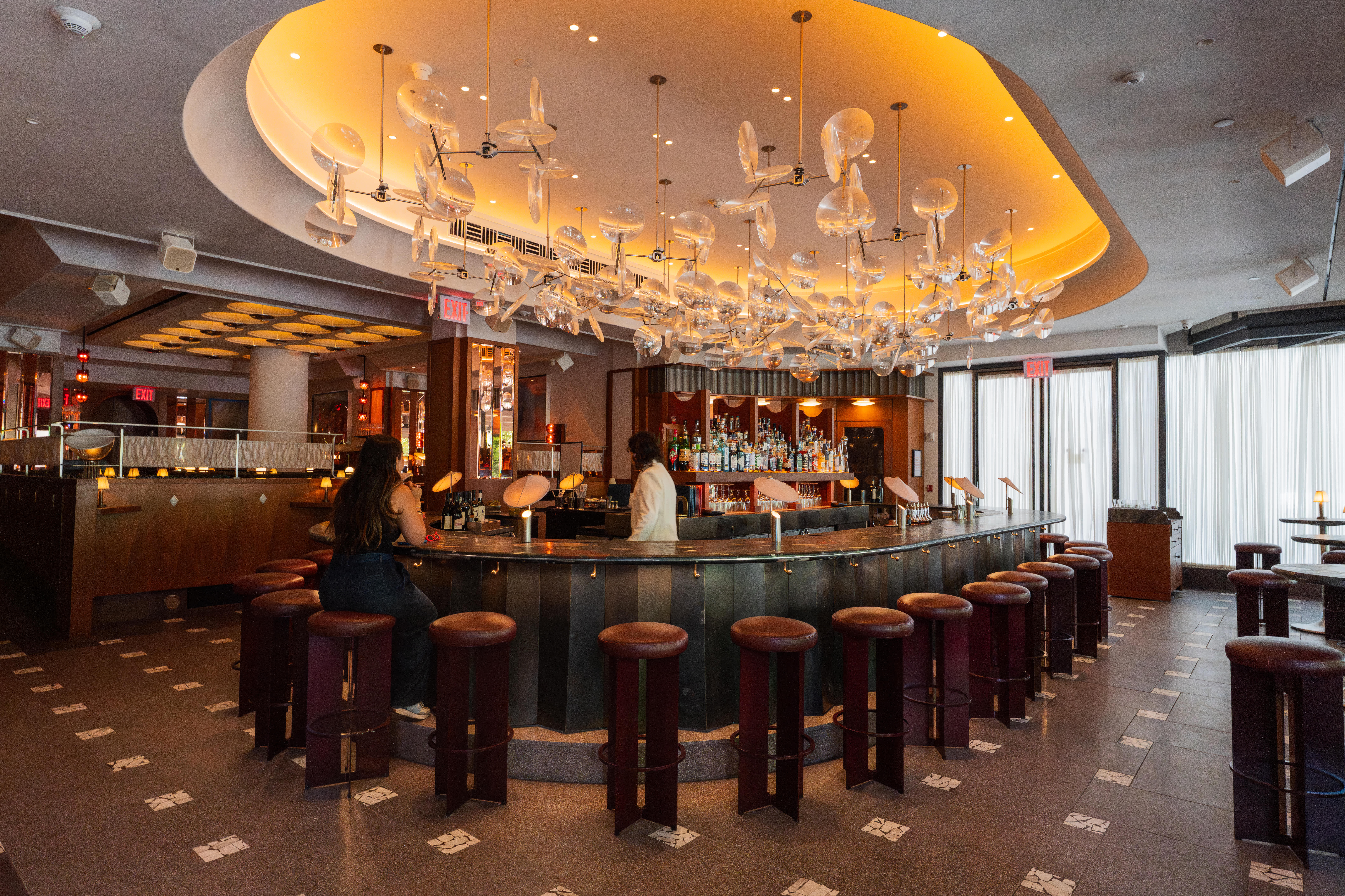 Modern District Lounge bar in NYC with elegant decor for cocktail receptions and networking.