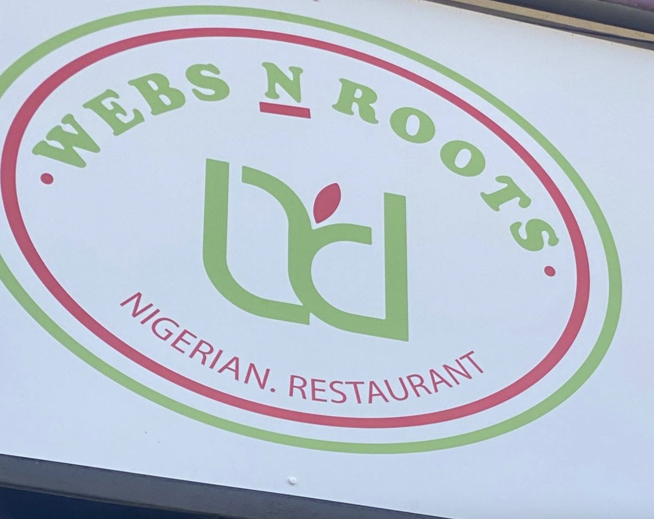 "Webs N Roots vibrant event space ideal for cultural gatherings and culinary experiences."