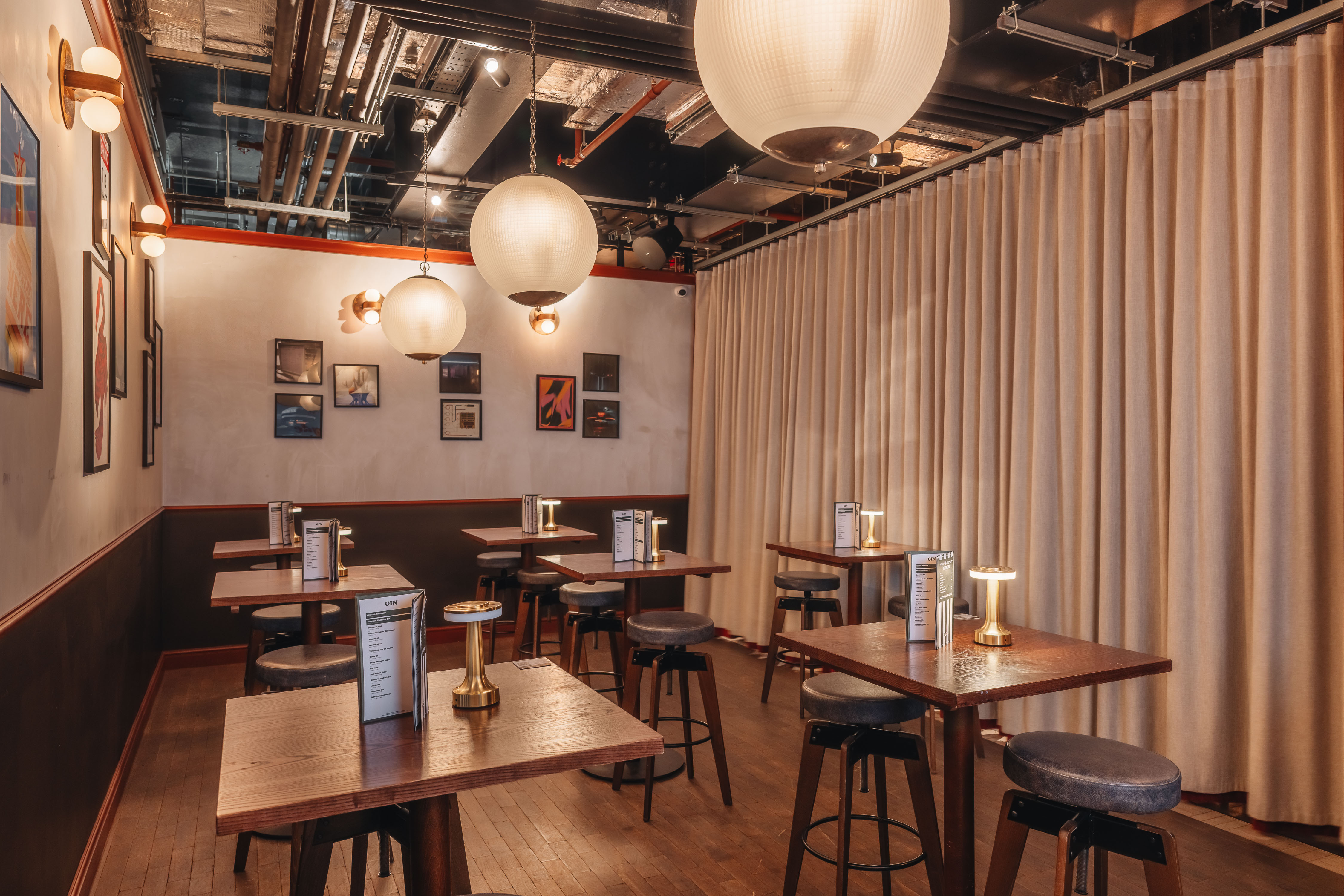 Intimate event space with warm lighting for gatherings and meetings at Arcade Battersea.