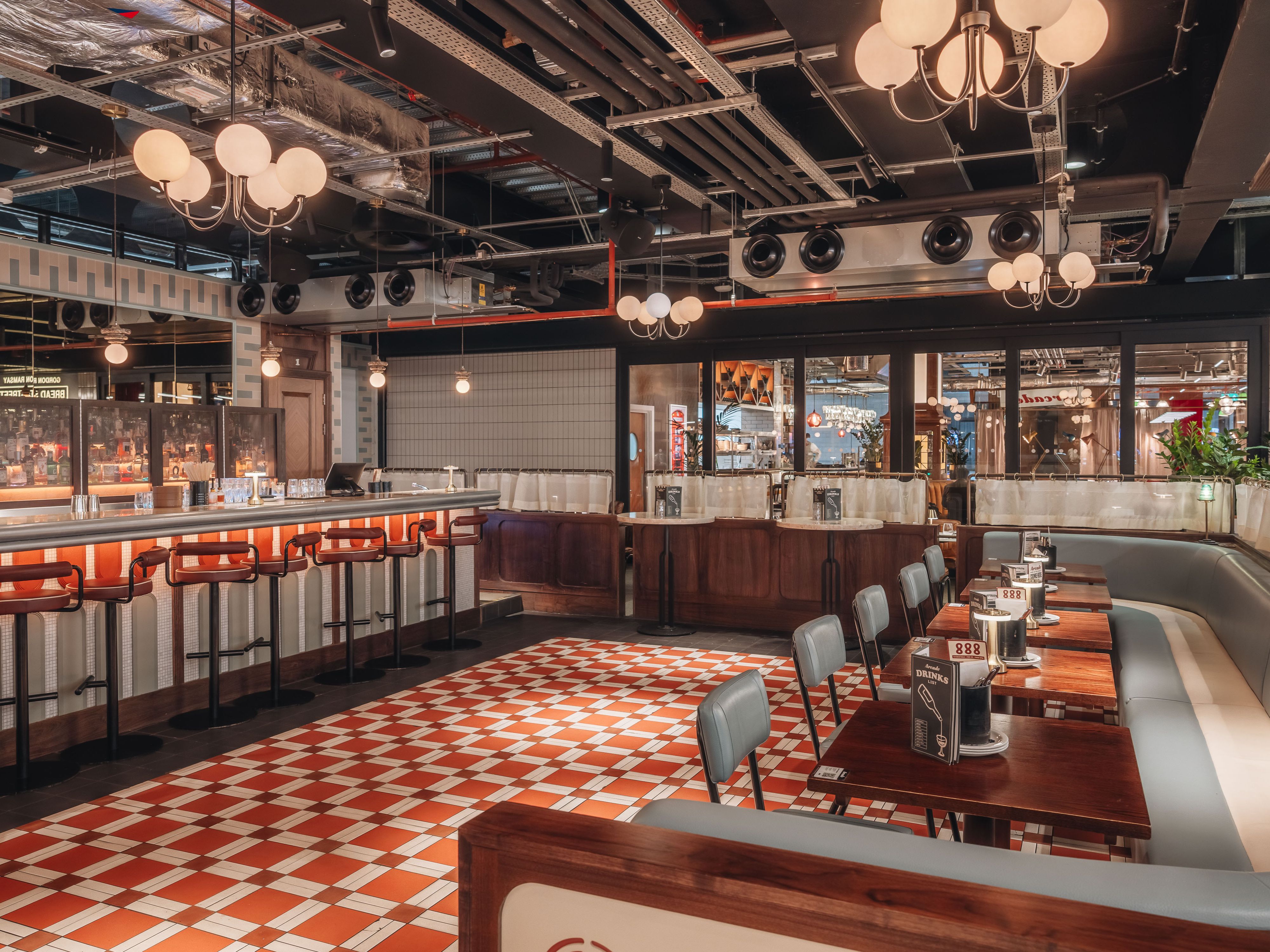 Full Venue Hire in Arcade Battersea, stylish bar area, ideal for networking events.