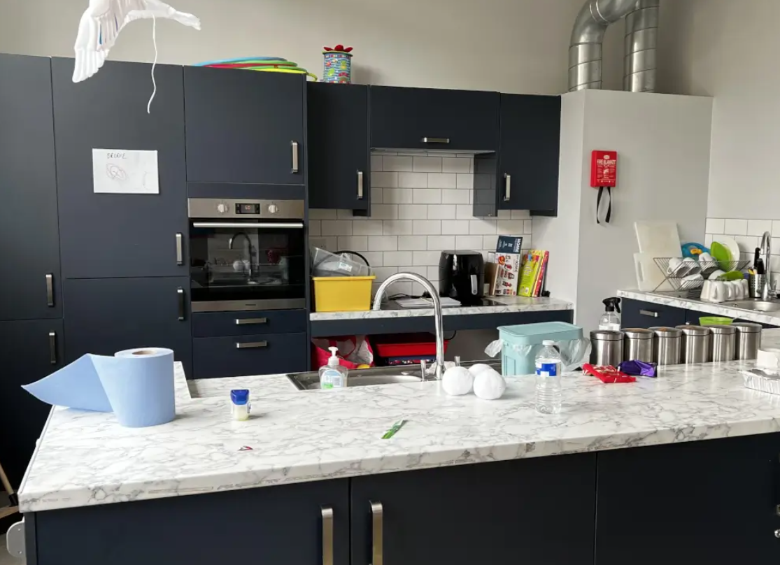 Allie Harper in a modern kitchen at Ivy Street Family Centre, ideal for event catering.