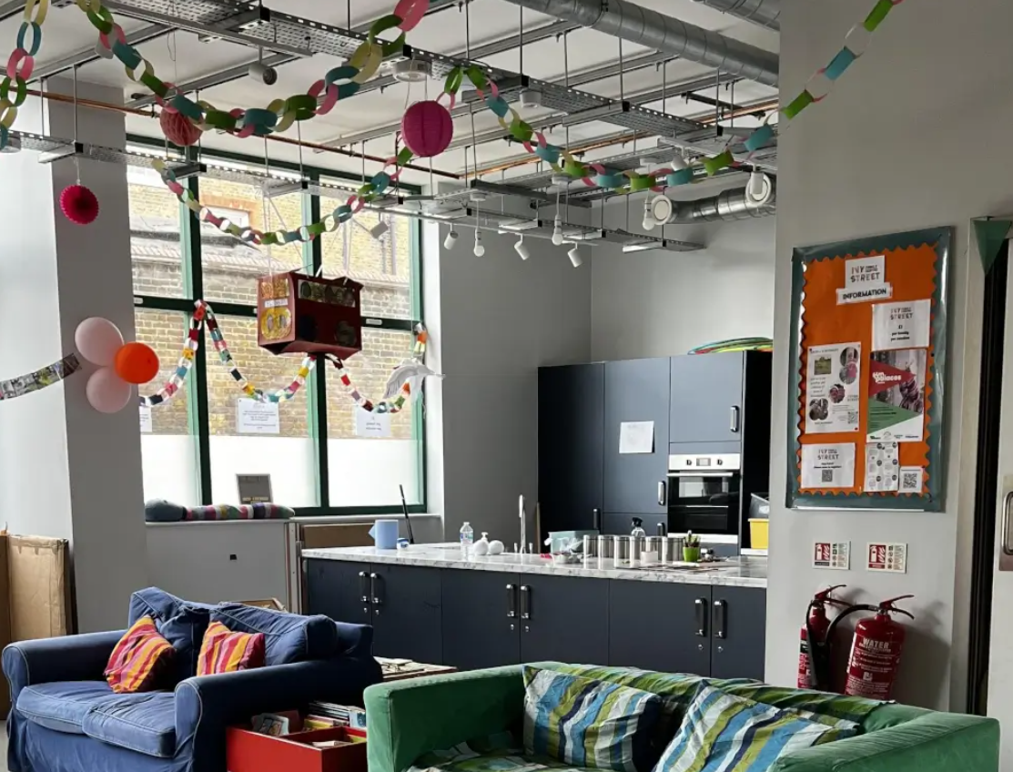 Allie Harper in Ivy Street Family Centre, vibrant space for casual gatherings and networking.