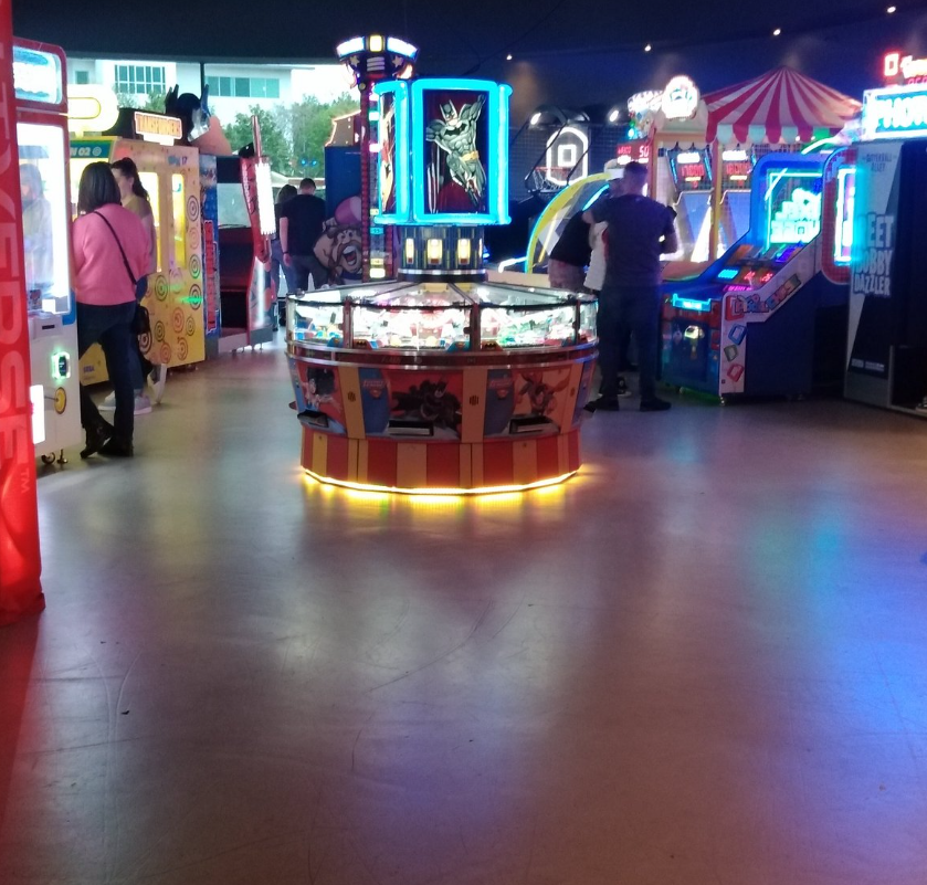 Gutterball Lincoln venue with vibrant arcade machines for team-building events.