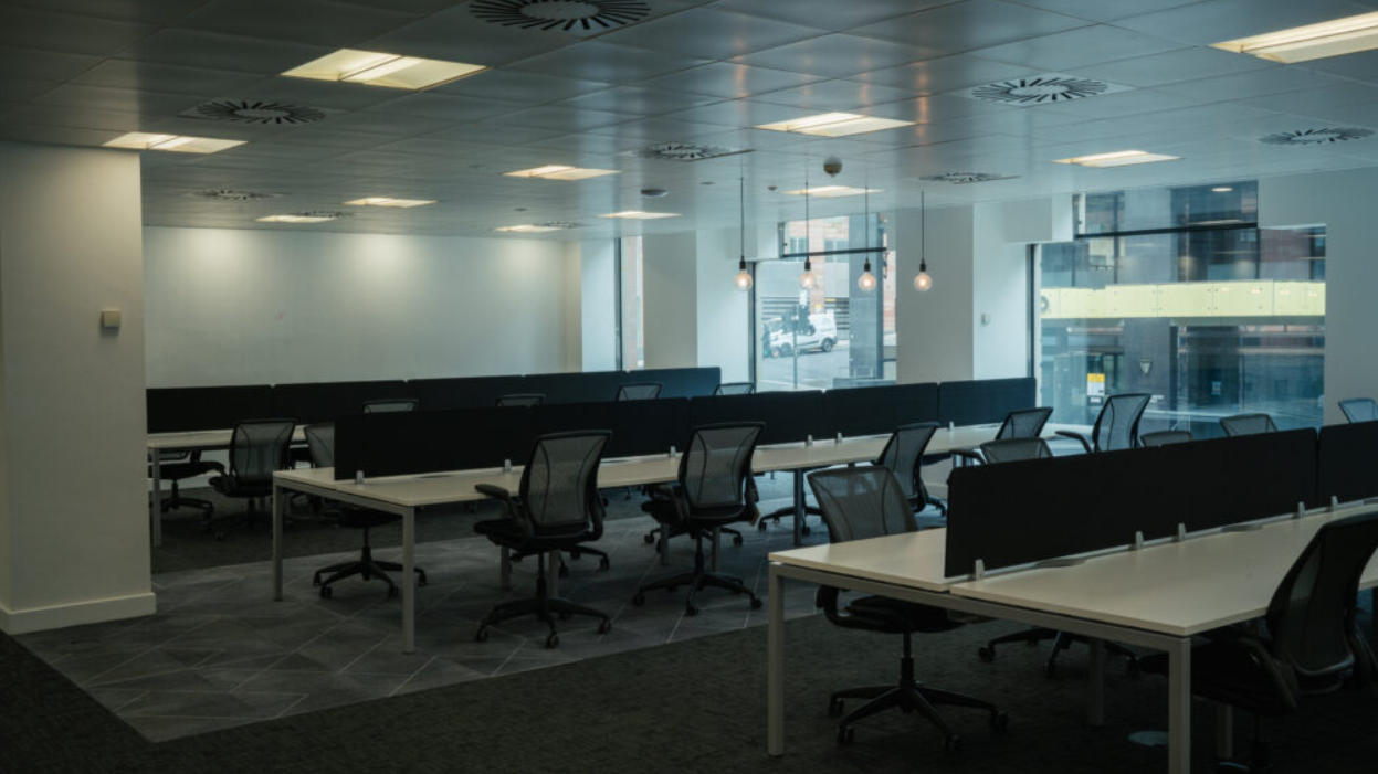 Modern open office in Kirkstane House with ergonomic workstations for corporate events.