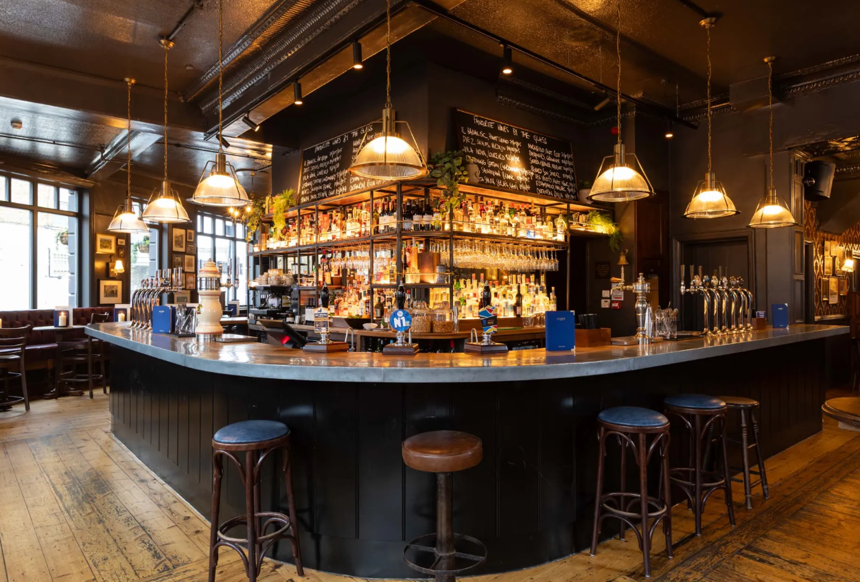 Whole Venue Hire St John's Tavern - stylish bar, warm lighting, networking events, casual gatherings.