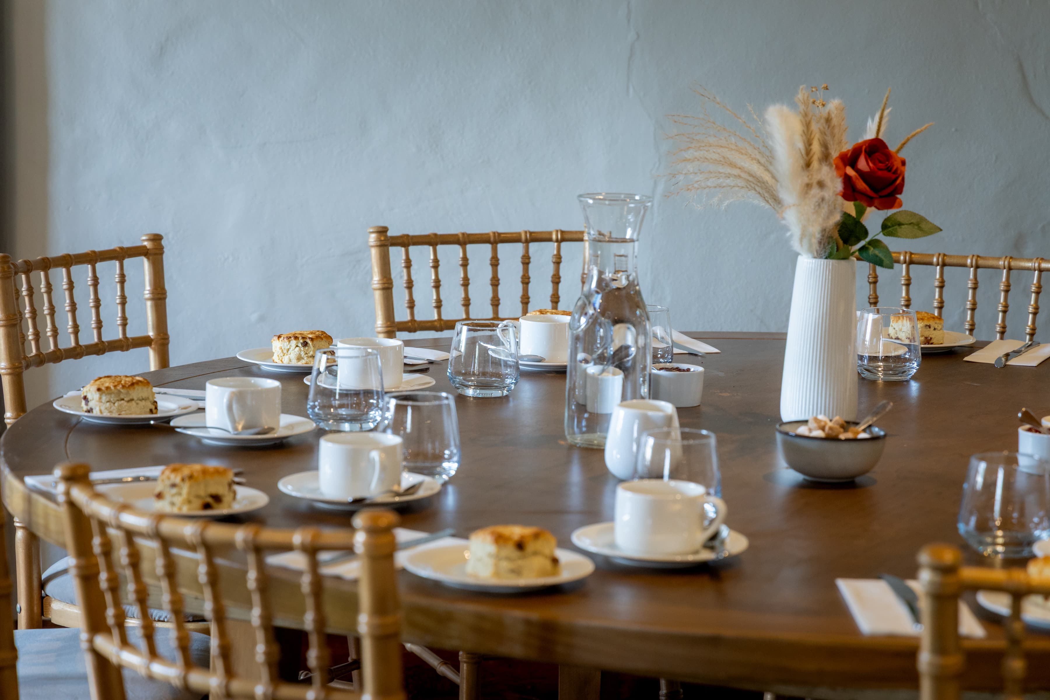 Gatehouse boardroom meeting with gold chairs for professional corporate events and workshops.
