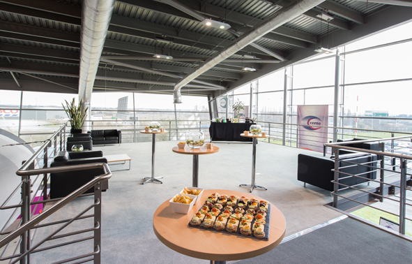 Modern event space with sleek design and natural light for corporate gatherings.