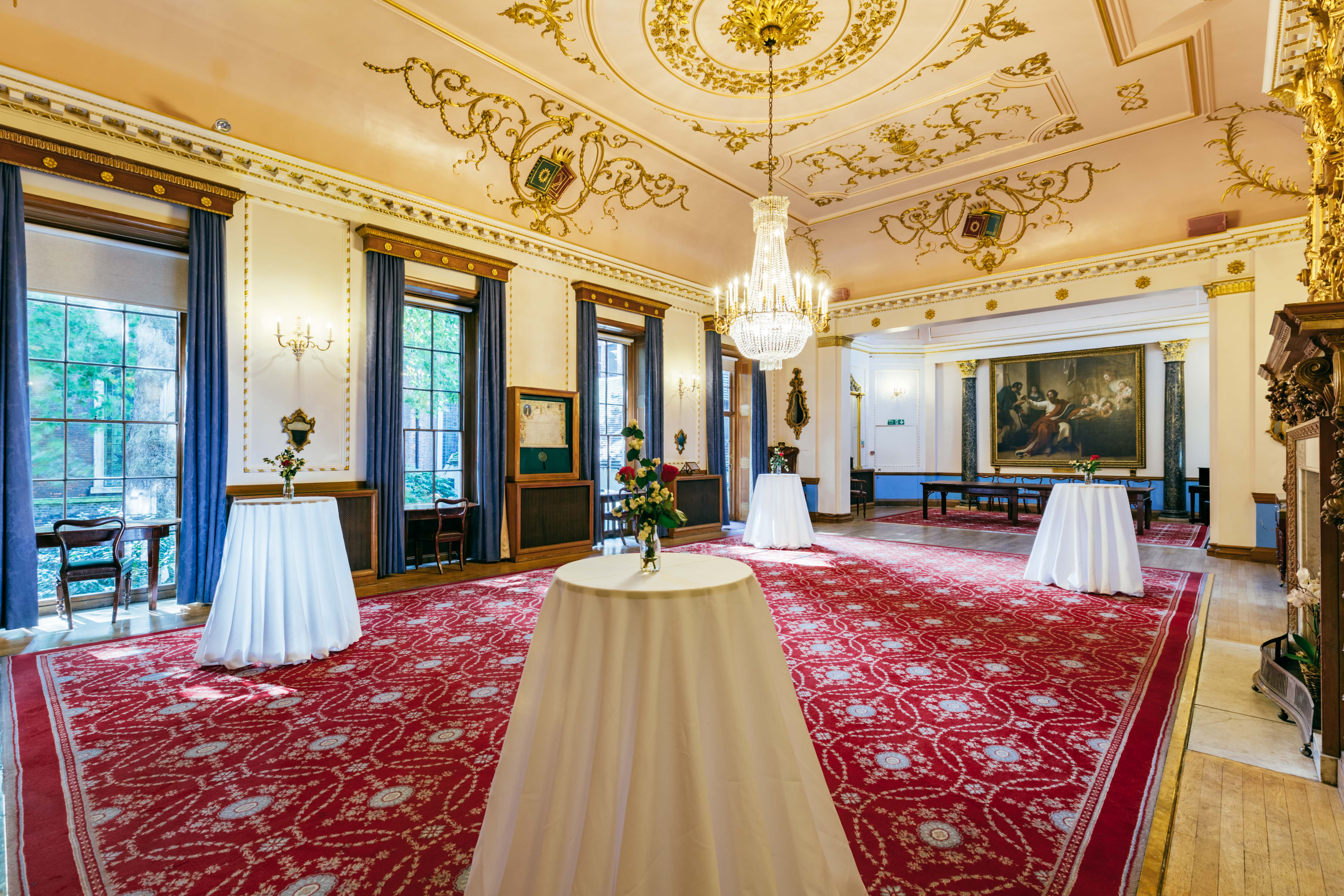 Elegant event space in Stationers' Hall with chandeliers, perfect for upscale receptions.