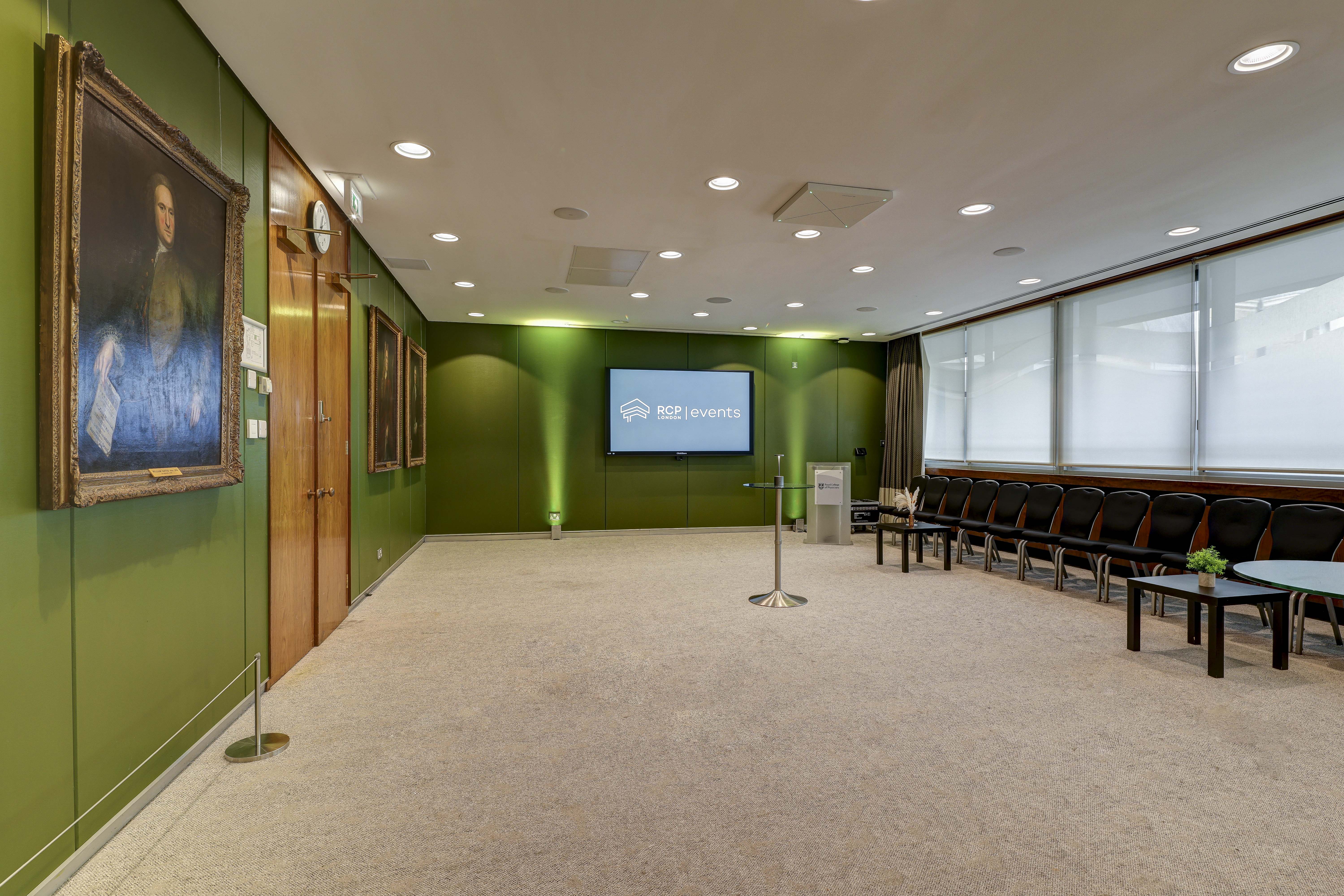 Linacre & Sloane Rooms, RCP London: modern meeting space with screen for events.
