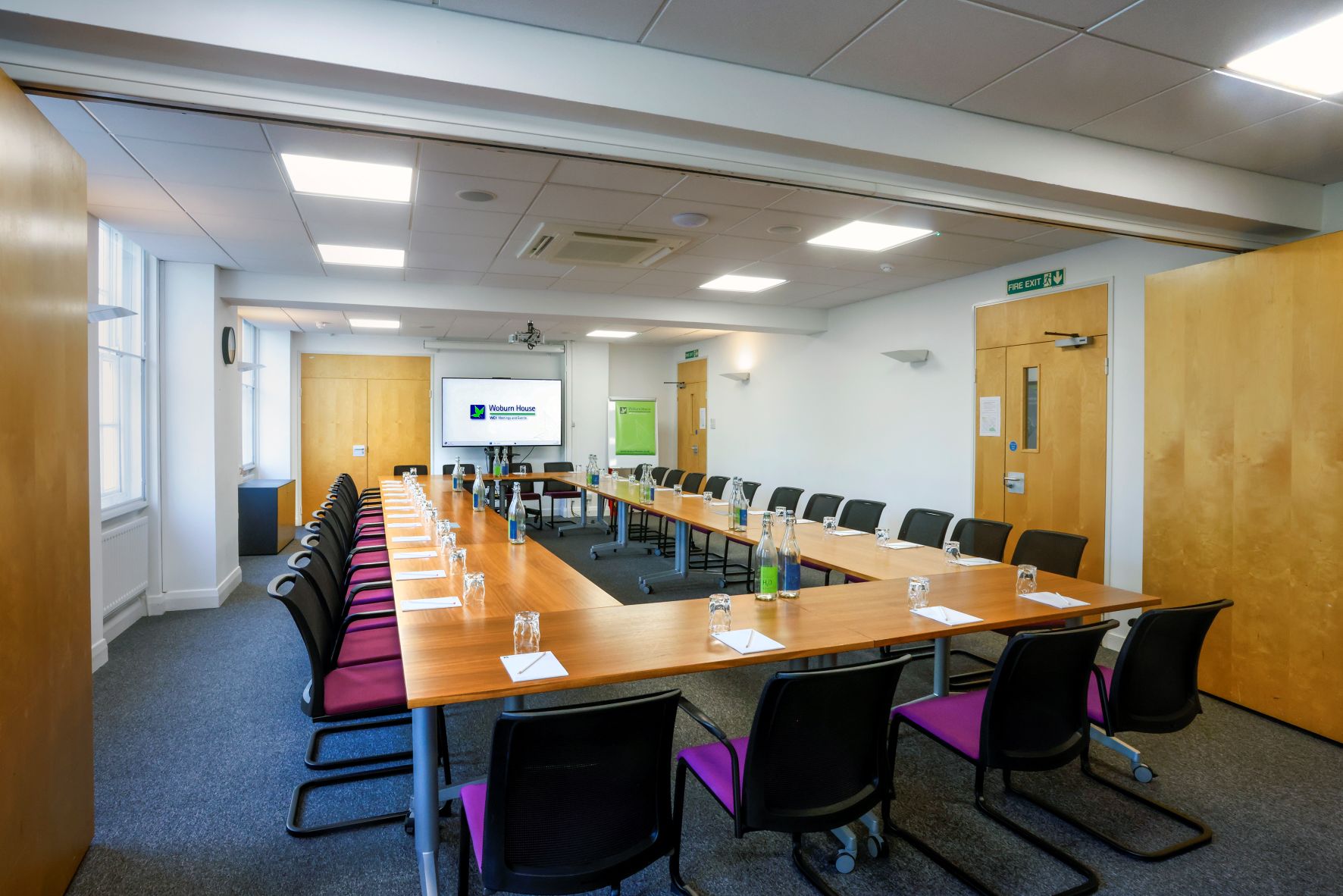 UCEA Boardroom at Woburn House: spacious meeting room with AV setup for presentations.