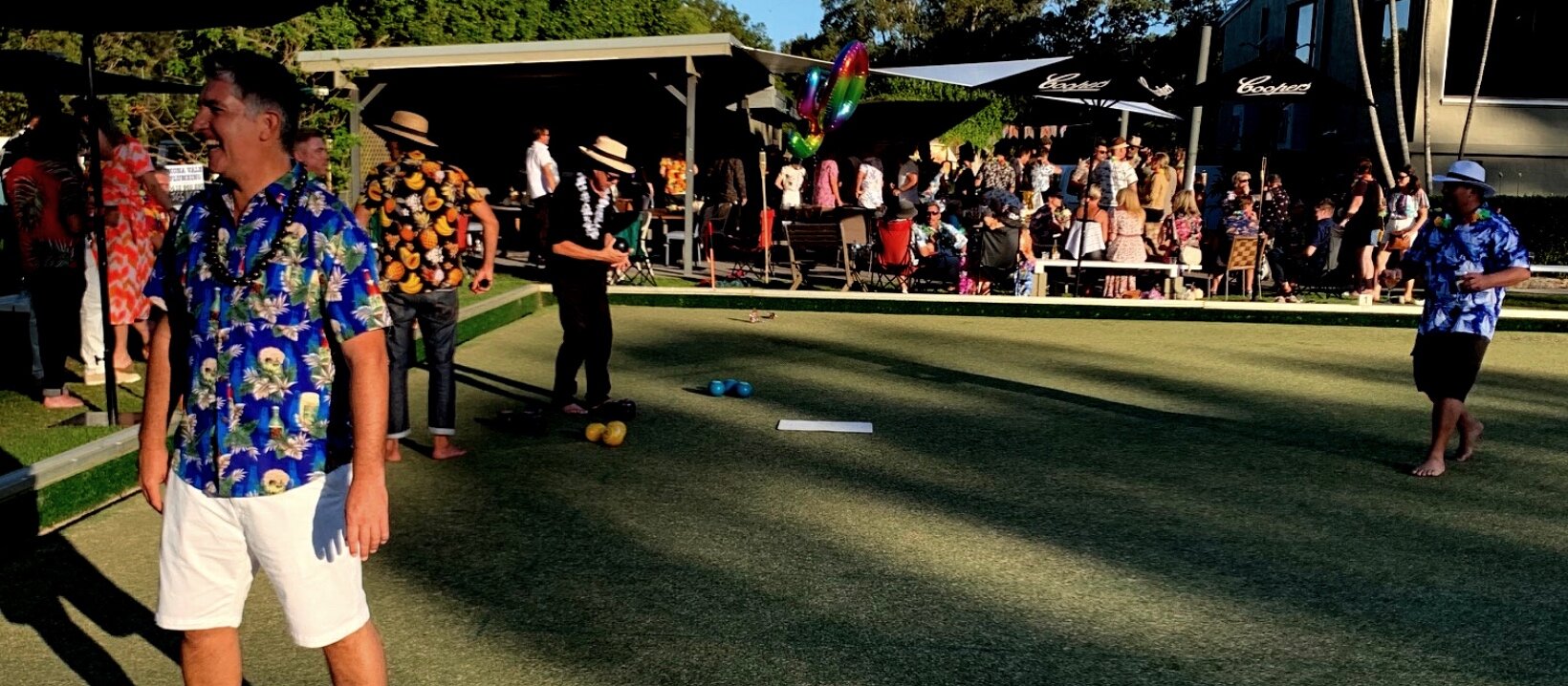 BBQ area at Avalon Bowlo with bowling green, vibrant setting for social gatherings and events.