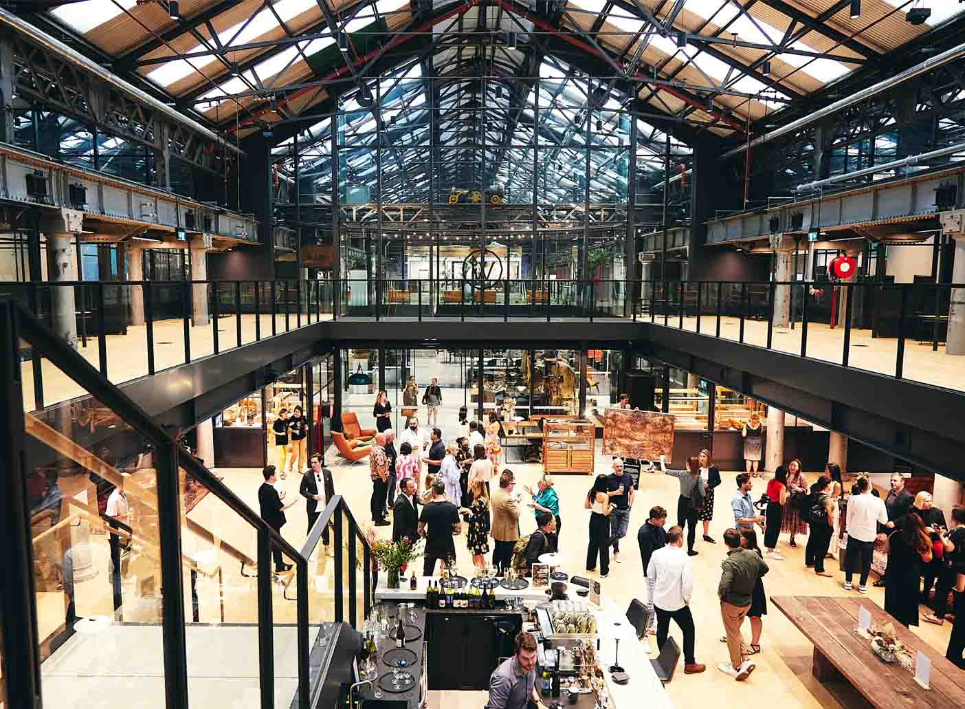 Vibrant event space with high ceilings at Coastal Env Centre for corporate meetings and networking.