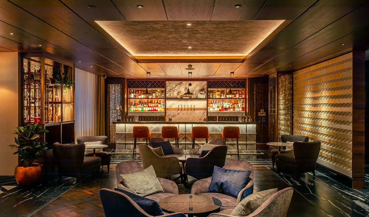 Sophisticated bar at The Folio Bar and Kitchen, ideal for networking events and after-hours gatherings.