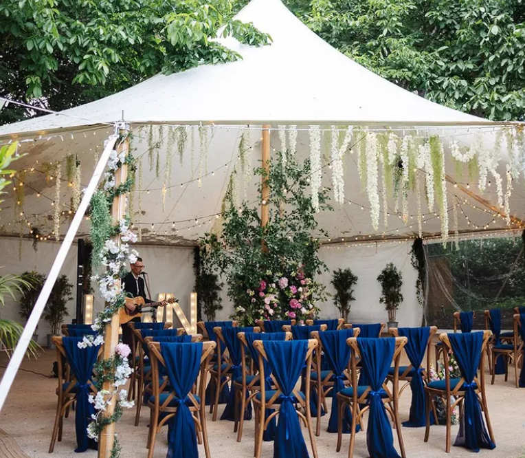 Elegant event tent at The Gonville Hotel with floral decor for intimate weddings.