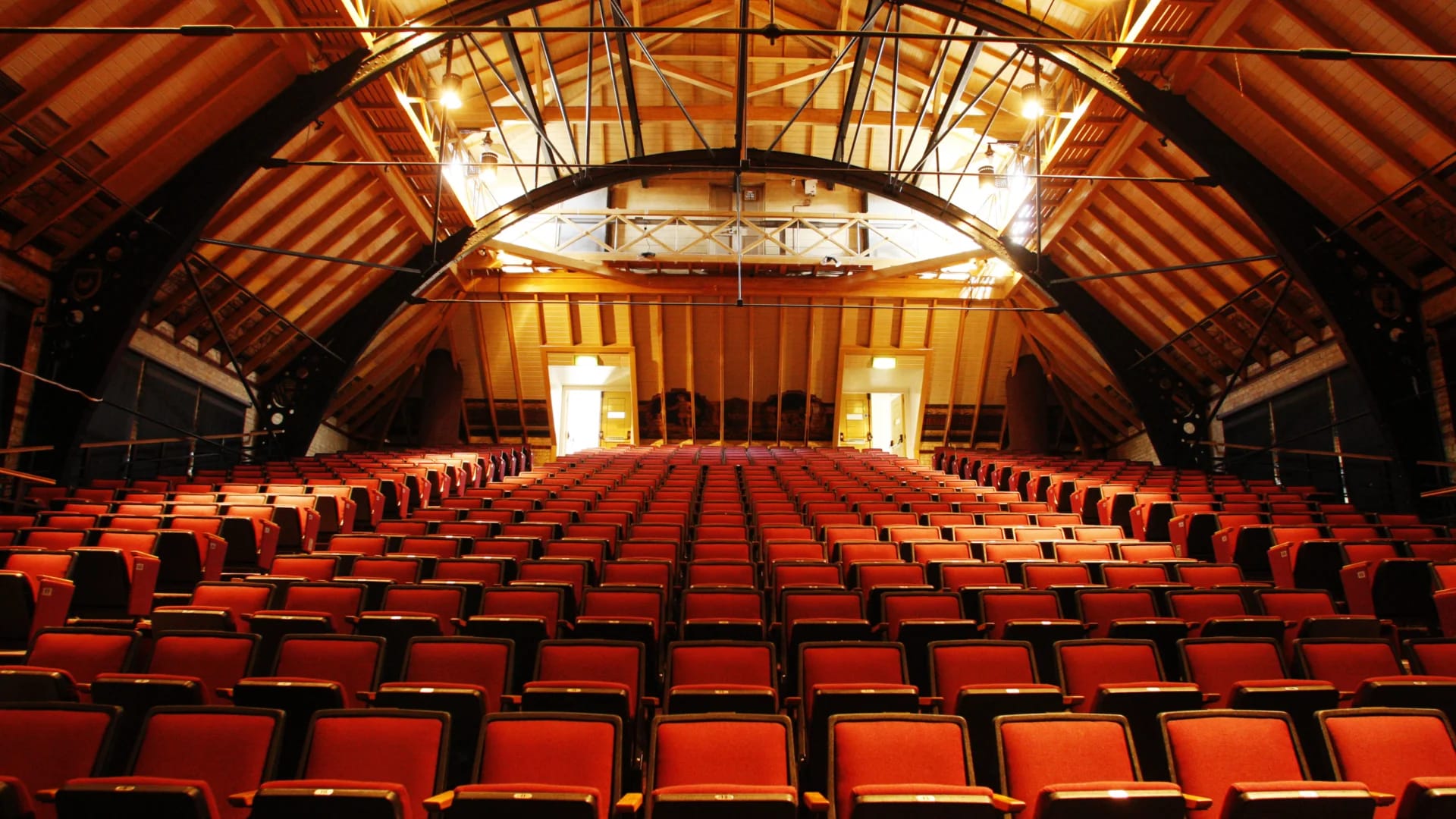 Cambridge Corn Exchange auditorium with rustic timber architecture for events and presentations.