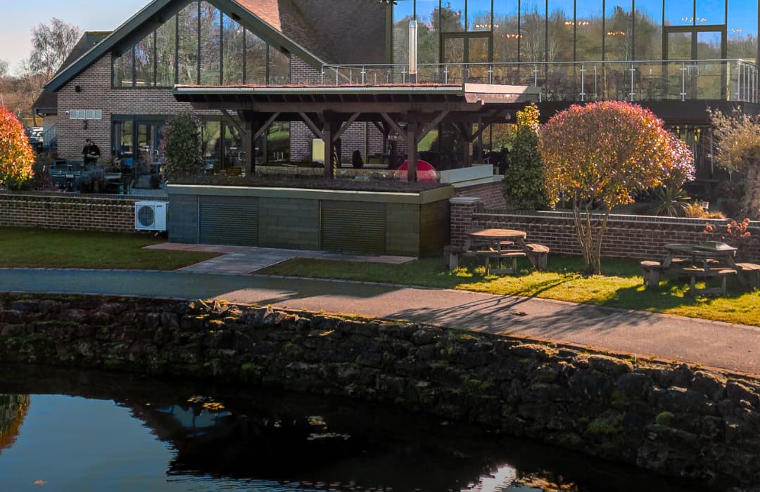 Waterside terrace at Cambridge Country Club, ideal for corporate retreats and networking events.