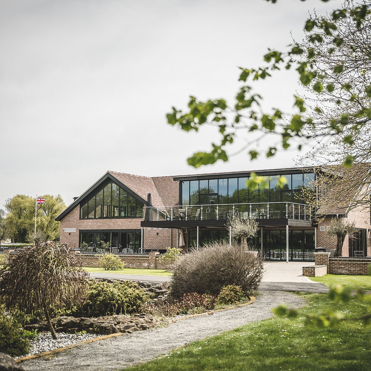 The Terrace at Cambridge Country Club, modern glass venue for corporate retreats and networking.