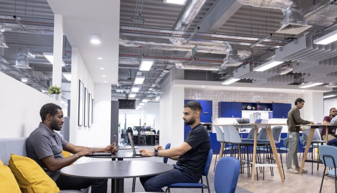 Modern office space in The Arena, featuring collaborative seating for meetings and events.