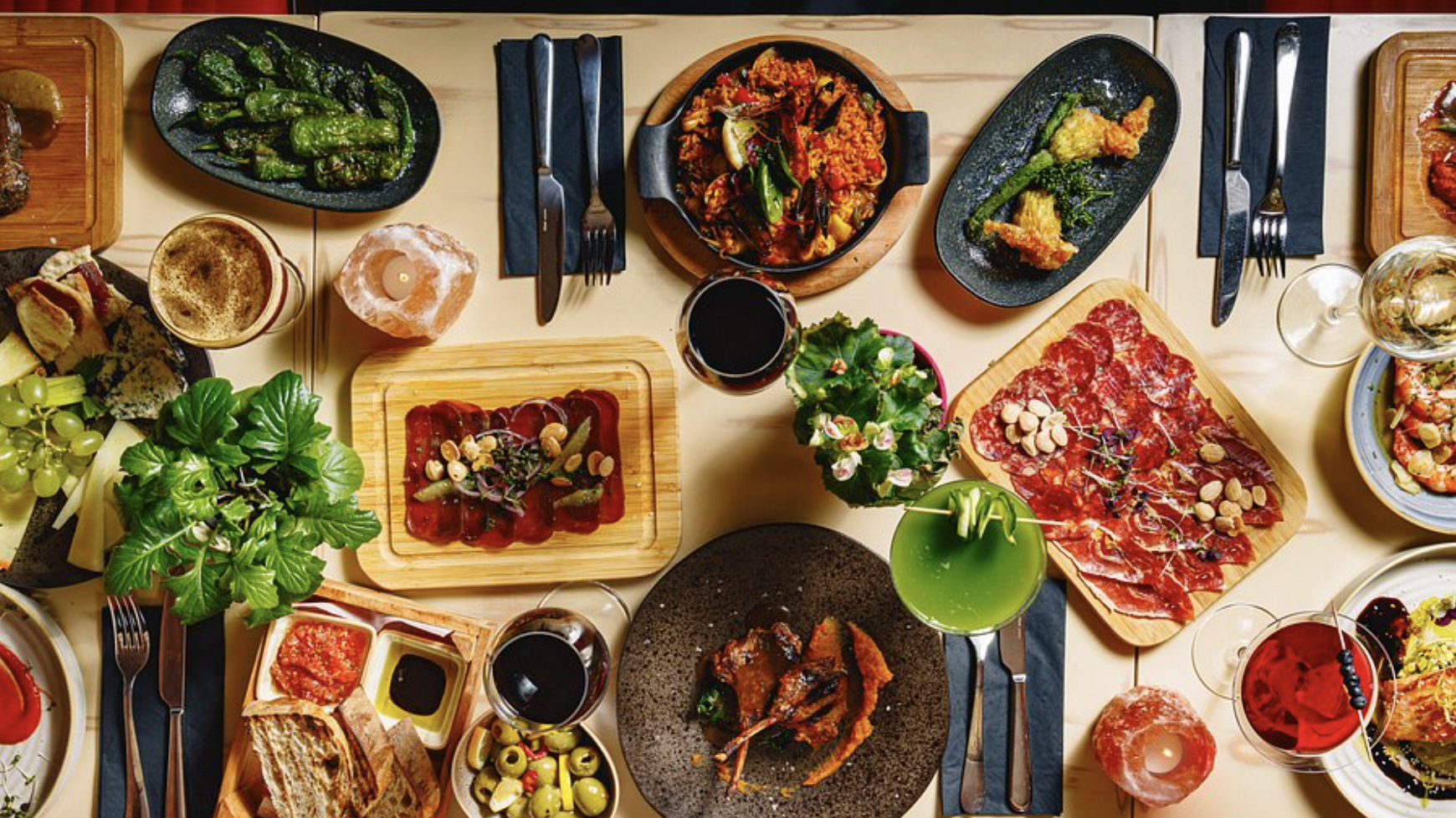 Luna Llena Restaurant banquet table with vibrant dishes for networking events.