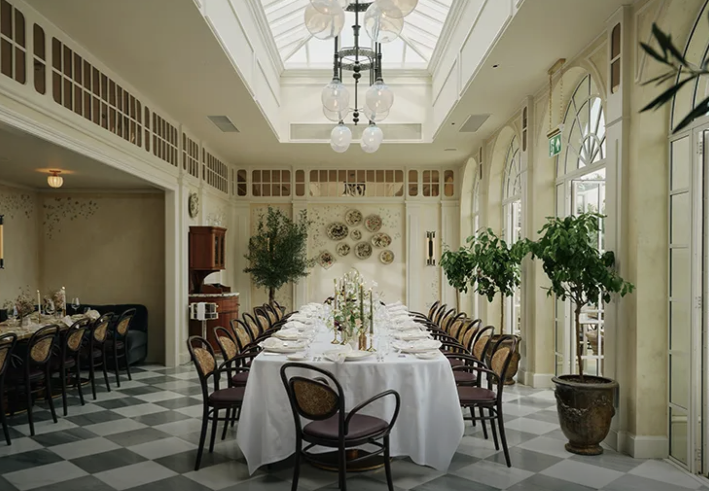Elegant dining room in The Orangery, Estelle Manor; perfect for upscale events and gatherings.