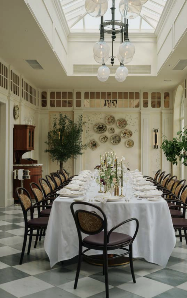 Elegant dining setup in The Orangery, Estelle Manor for formal events and gatherings.