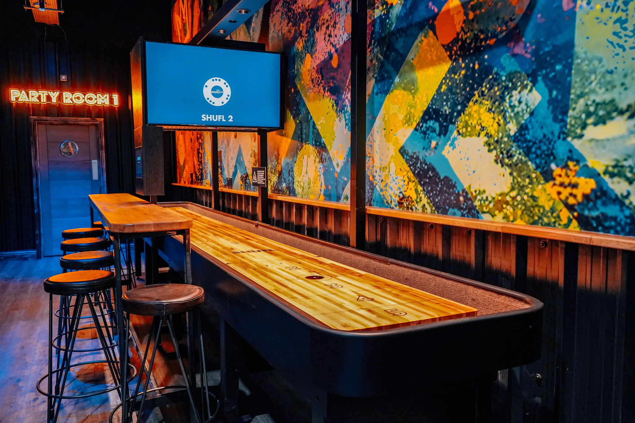 Head To Head Zone at King Pins, Glasgow - modern shuffleboard, ideal for corporate events.