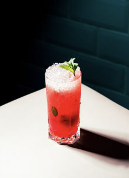 Cocktail with mint garnish at upscale Venue hire in The Loft Bar Leicester event.