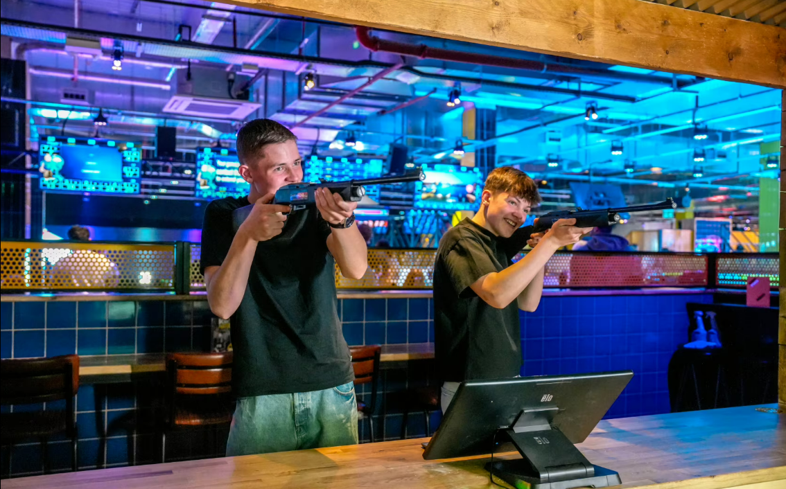 Partial Venue Hire at King Pins Silverburn with modern shooting simulation for team-building events