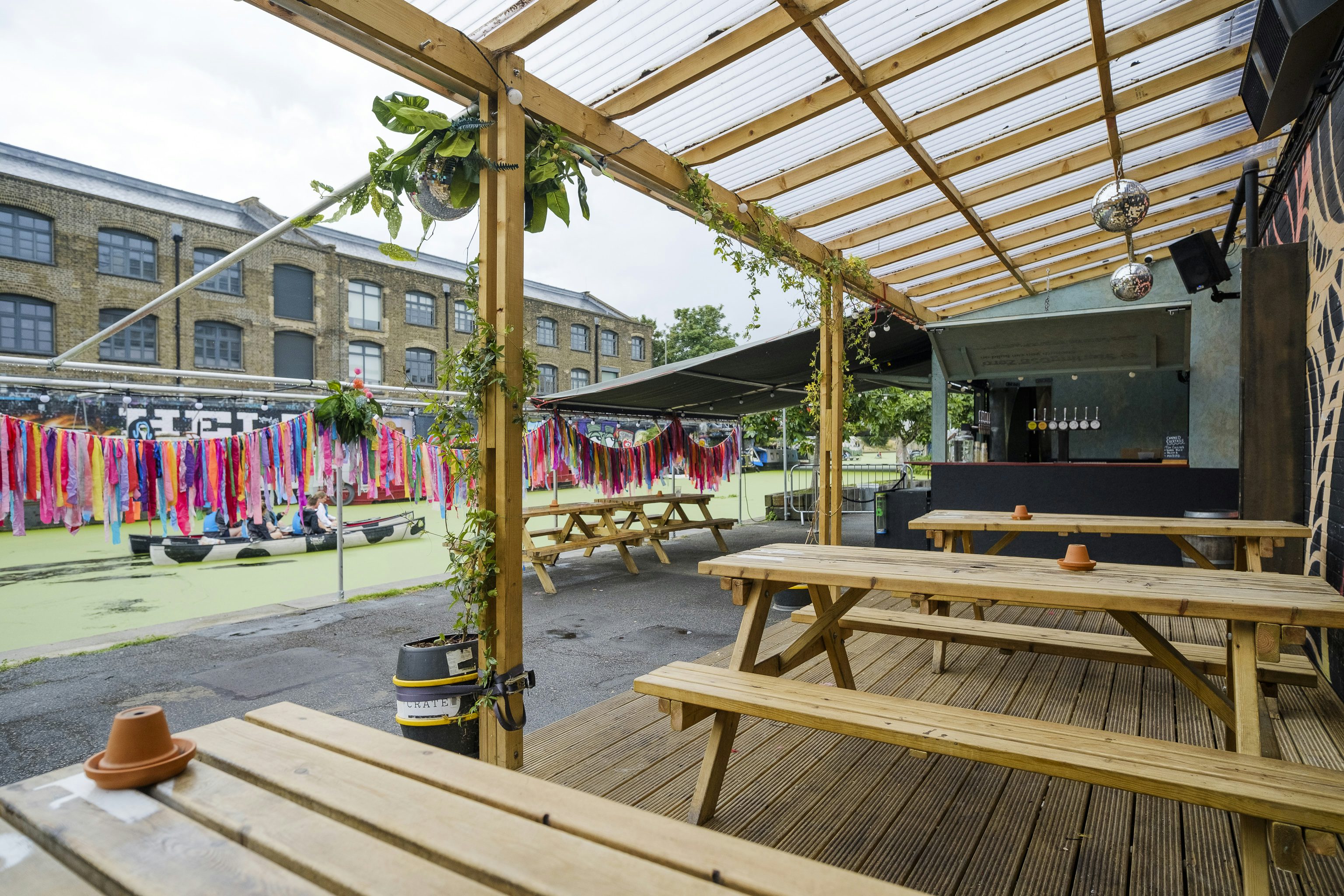 Outdoor breakout space at CRATE Brewery, featuring picnic seating for networking and team events.