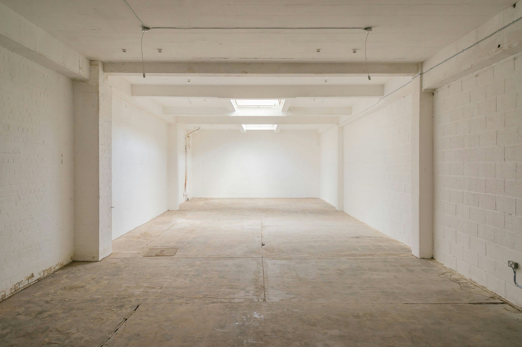 Industrial event space for pop-ups and art installations with blank-canvas venue design.