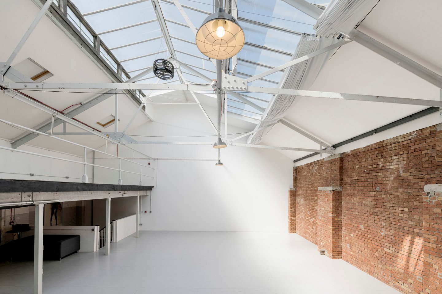 Industrial-chic event venue with open, airy space for workshops and pop-up exhibitions.