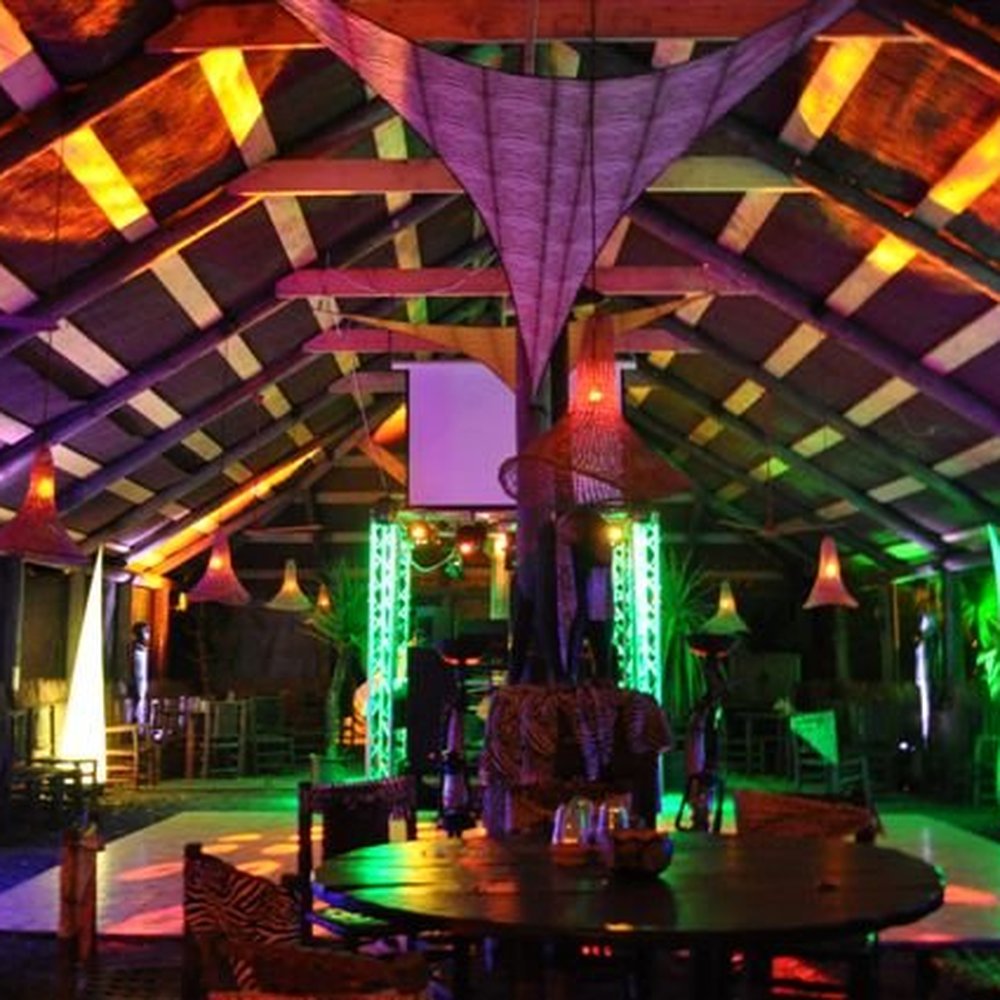Rustic Barn venue at The Punter with AV lighting, ideal for evening receptions and networking.