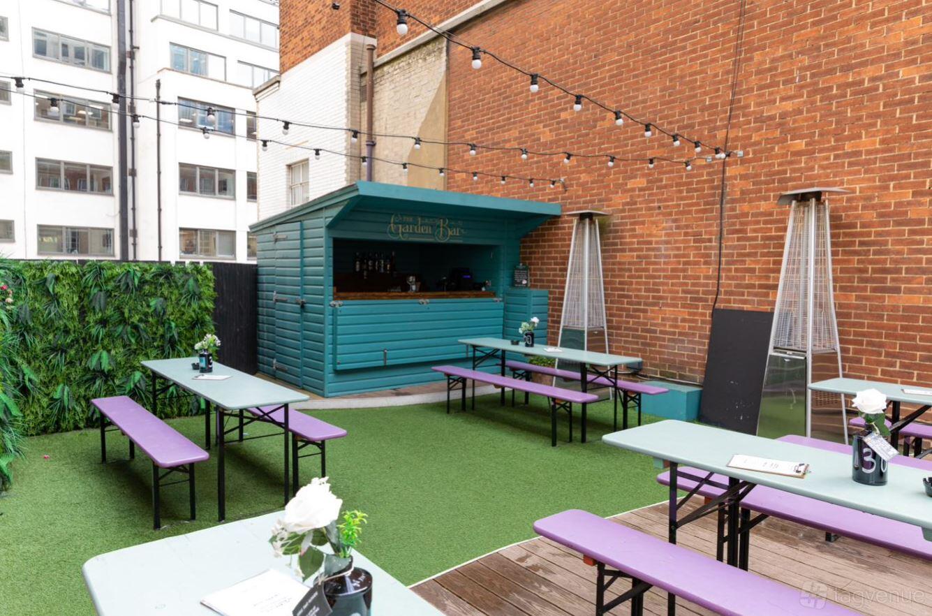 Stylish Roof Terrace at Three Tuns Aldgate, ideal for summer gatherings and networking events.