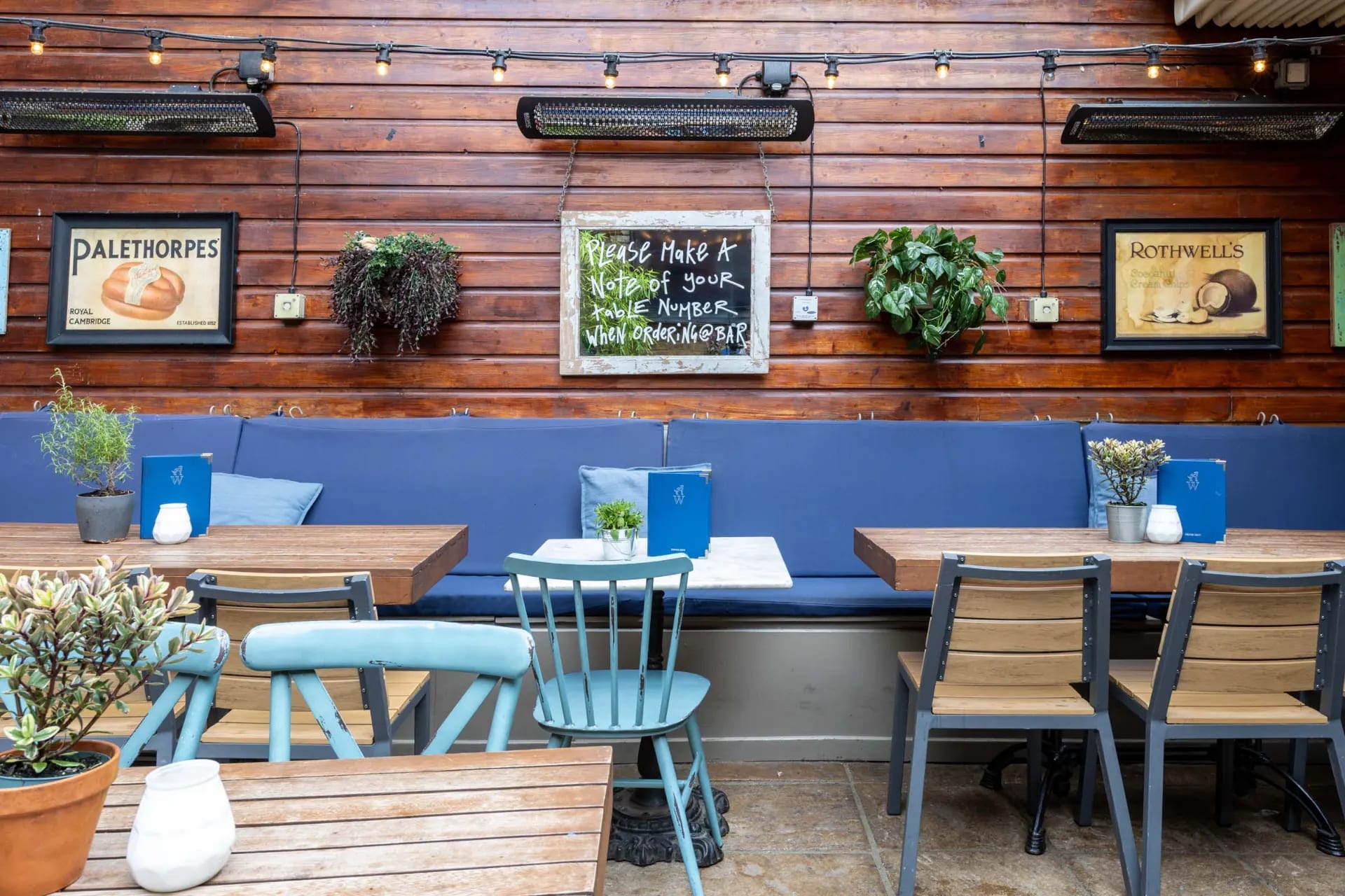 Cozy garden dining space at Whippet Inn for small meetings and events.