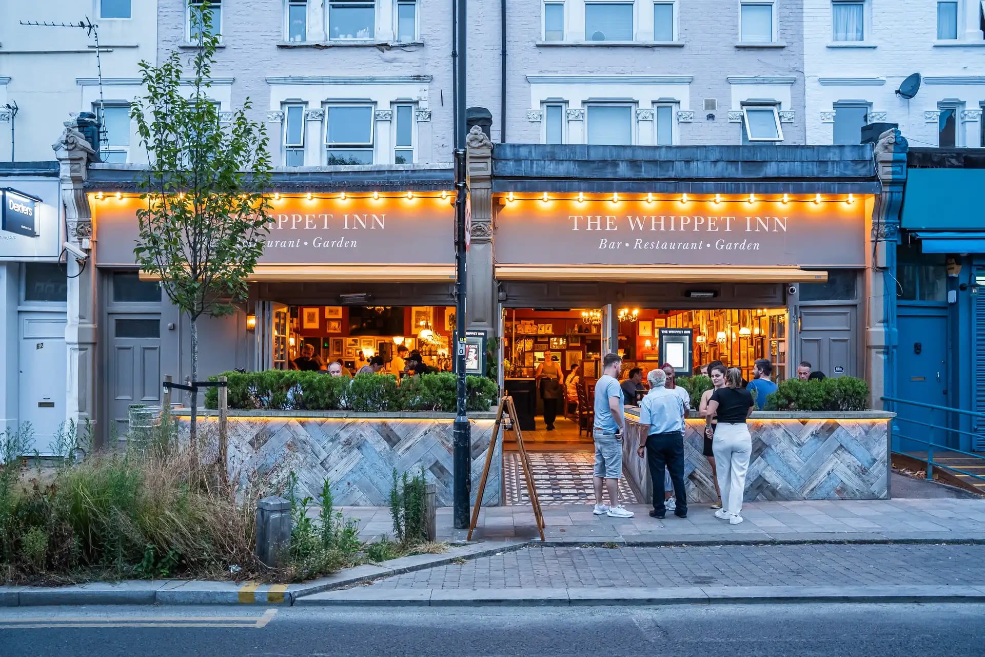 Whippet Inn Garden: inviting outdoor venue for casual meetings and networking events.