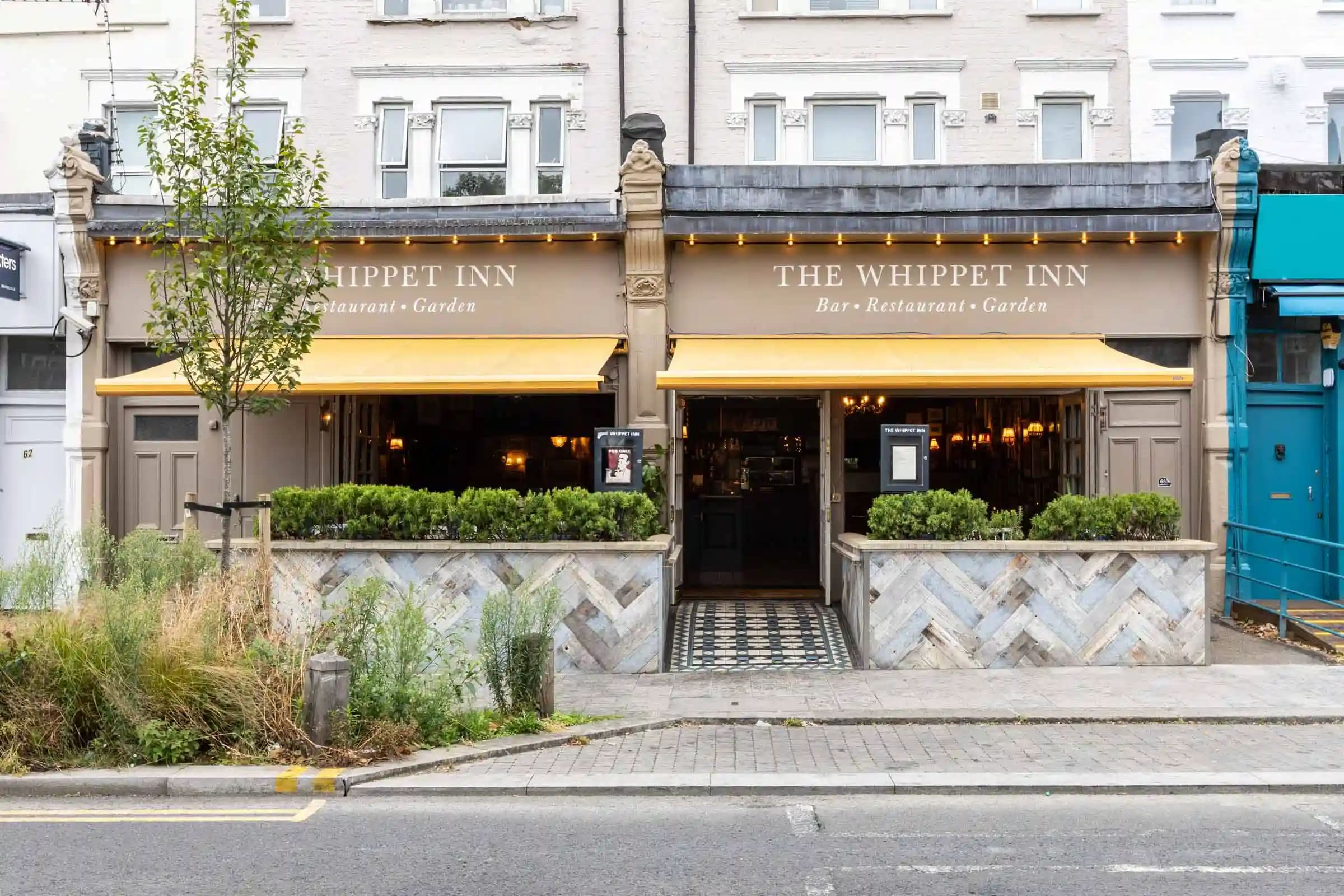 Charming outdoor venue at The Whippet Inn for casual meetings and social events.