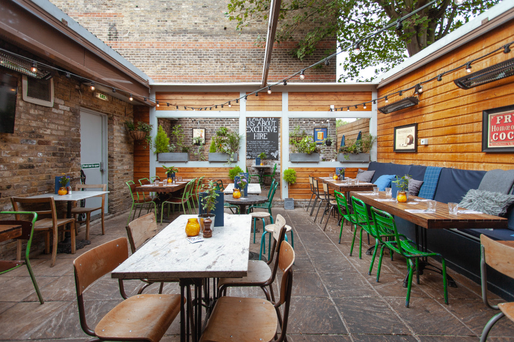 Charming outdoor venue at Whippet Inn, ideal for casual meetings and networking events.
