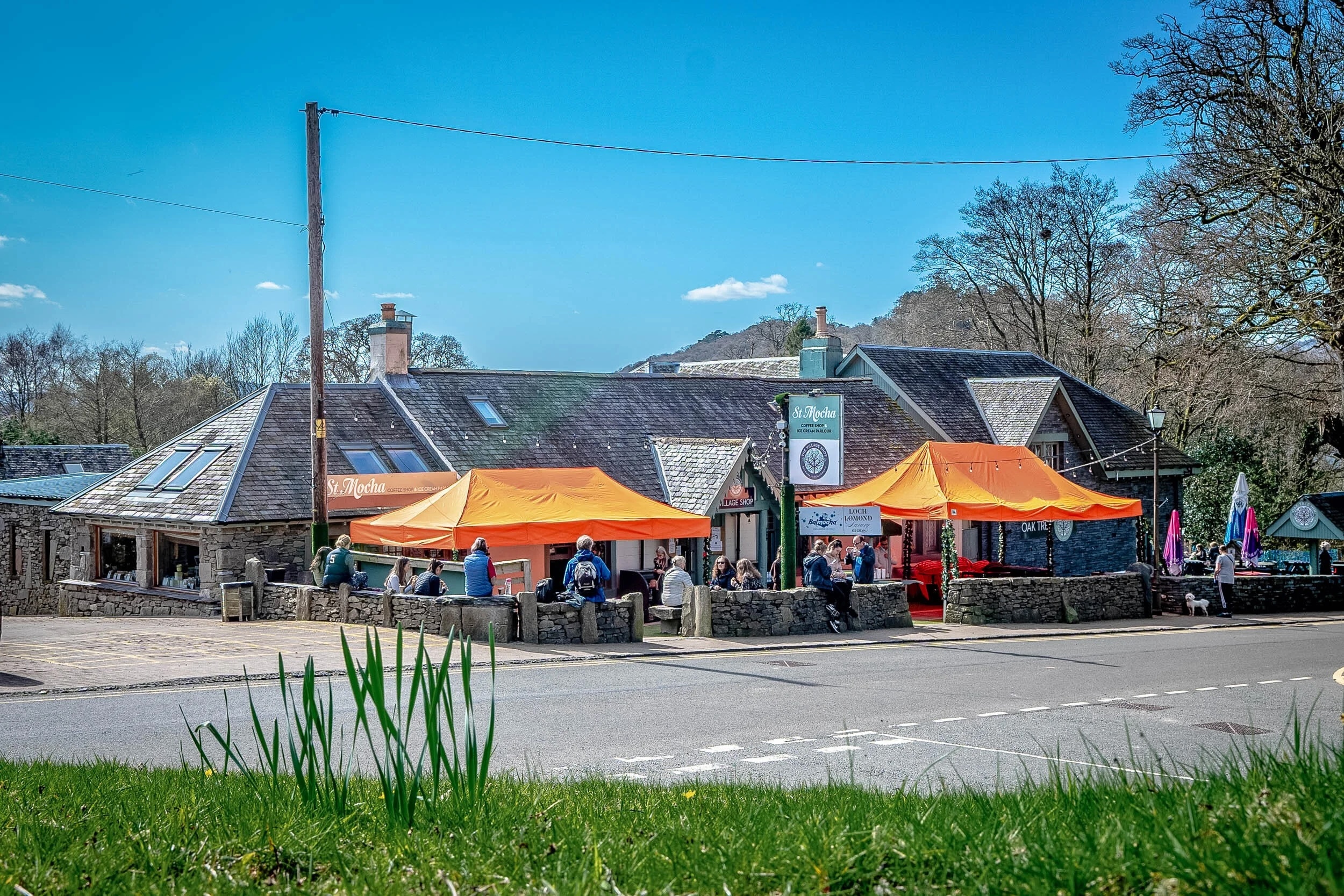 Outdoor event setup with orange tents at The Oak Tree Inn, perfect for gatherings.
