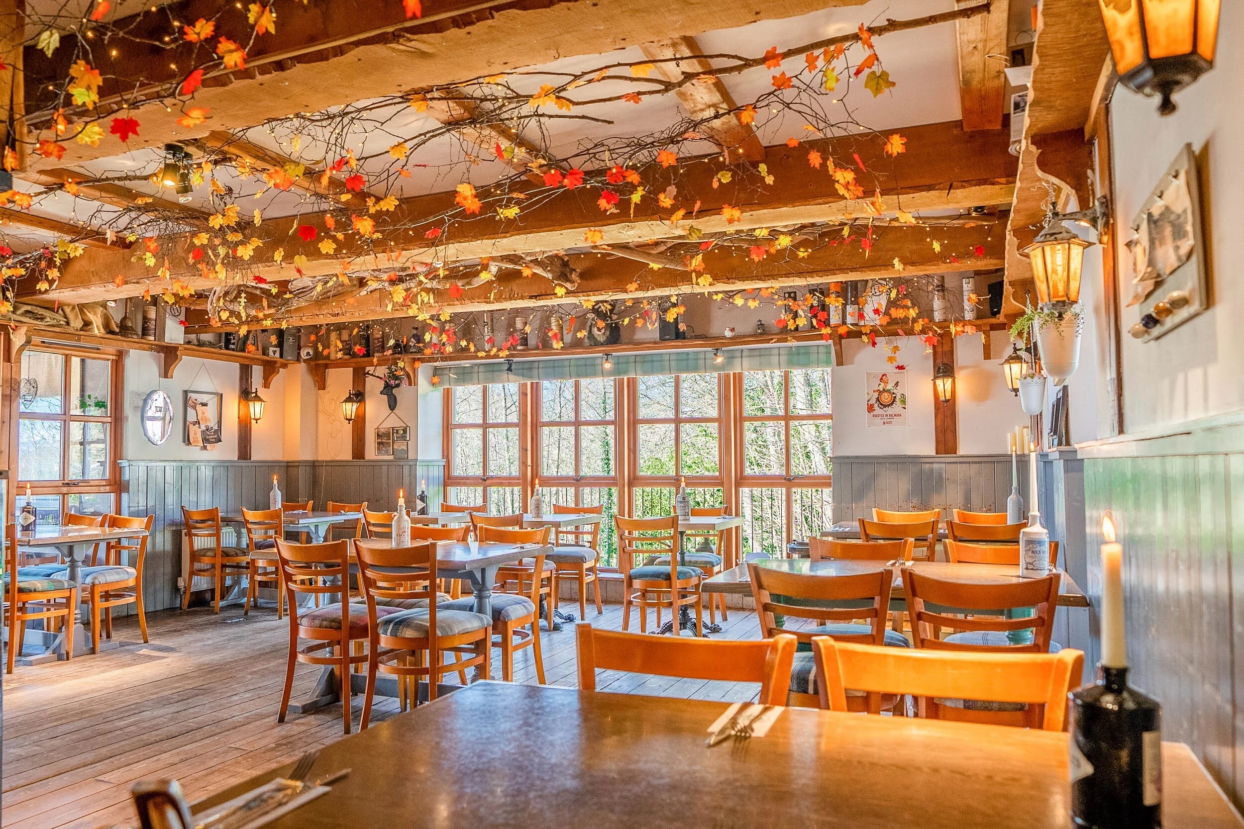 Rustic restaurant venue with large windows for cozy team retreats and gatherings.
