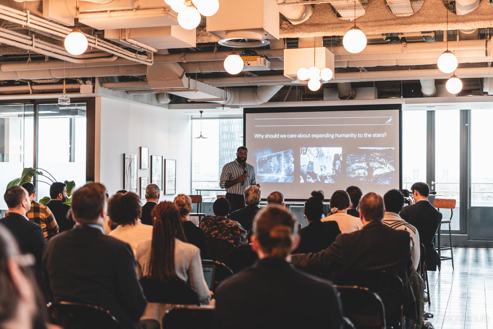 Professional meeting at Liverpool Street Event Space with engaged audience and modern venue.