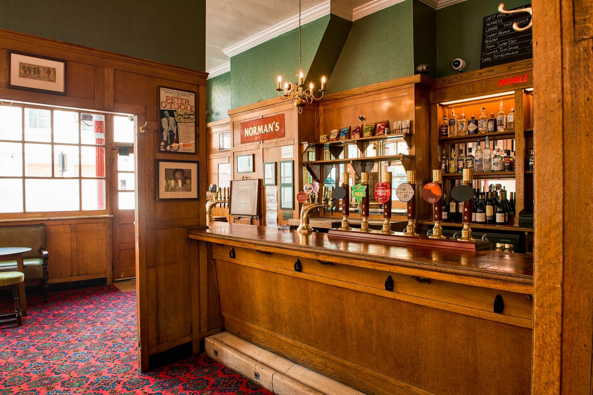 Cozy pub dining room with warm lighting, ideal for networking events and team-building.