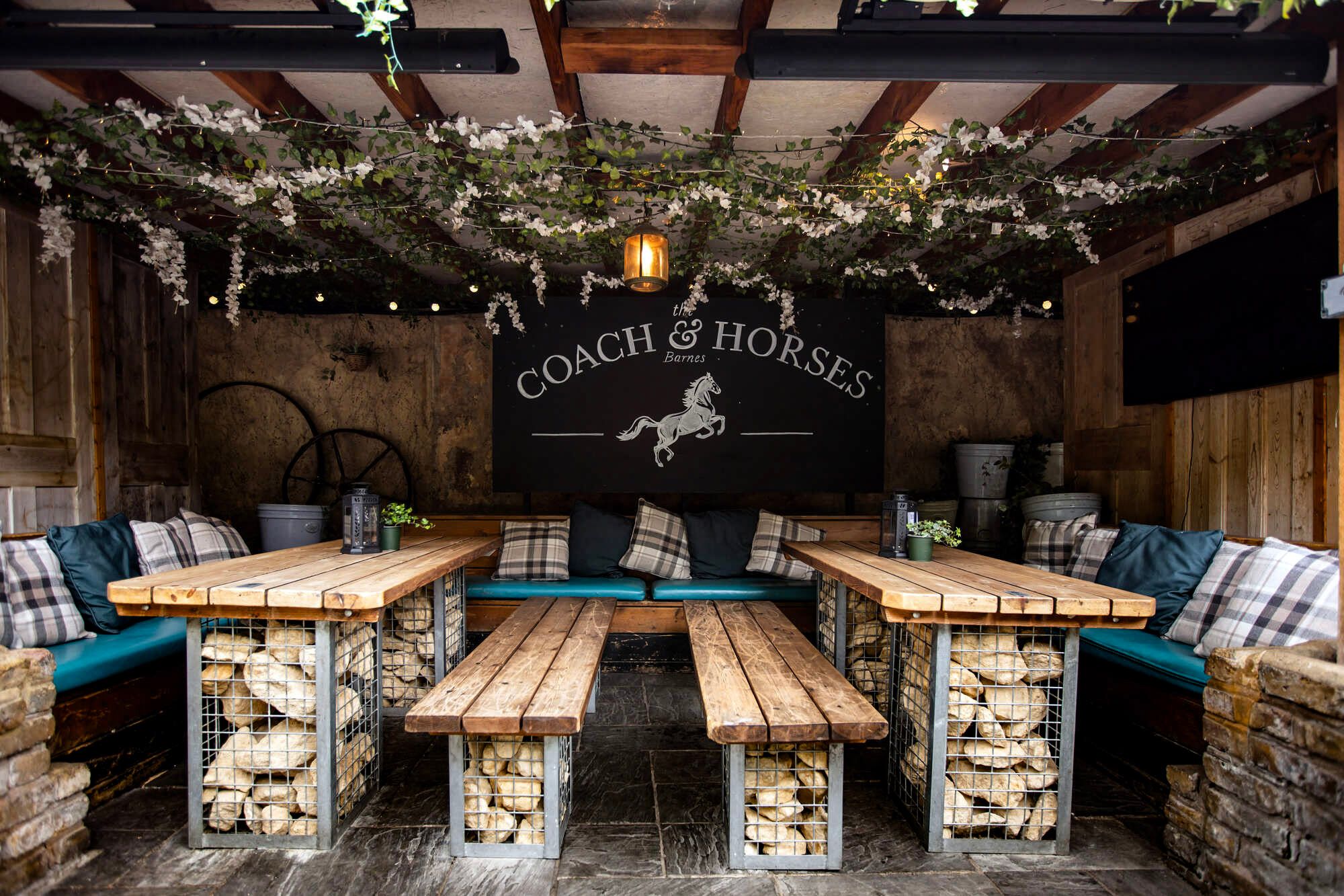 Charming dining room at Coach & Horses, ideal for intimate gatherings and team meetings.