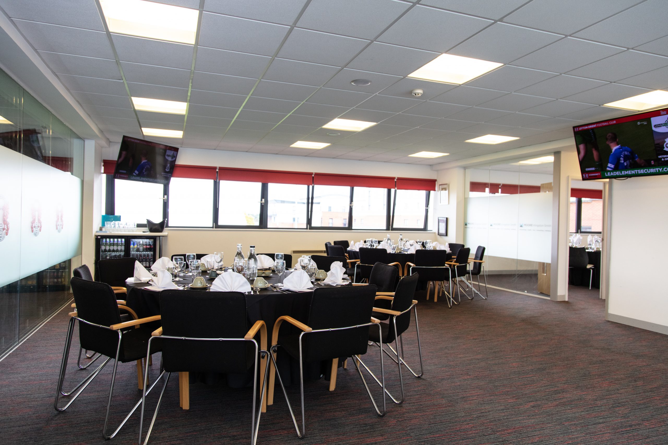 Private dining setup in Orient Lounge with elegant tables for meetings and events.