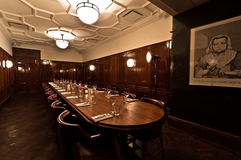 Private dining setup in Orient Lounge with polished table, perfect for corporate events.